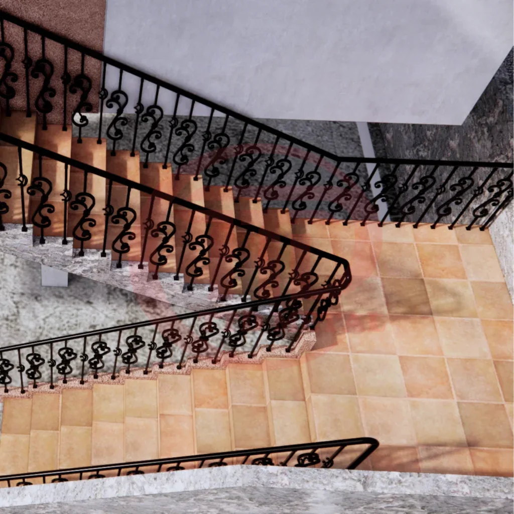 Black decorative railing following a curved interior staircase